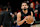 ATLANTA, GEORGIA - OCTOBER 23: Trae Young #11 of the Atlanta Hawks warms up prior to playing the Brooklyn Nets at State Farm Arena on October 23, 2024 in Atlanta, Georgia. NOTE TO USER: User expressly acknowledges and agrees that, by downloading and or using this photograph, User is consenting to the terms and conditions of the Getty Images License Agreement. (Photo by Paras Griffin/Getty Images)