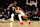 LOS ANGELES, CALIFORNIA - NOVEMBER 01: Shai Gilgeous-Alexander #2 of the Oklahoma City Thunder handles the ball against Paul George #13 of the Los Angeles Clippers during the fourth quarter at Staples Center on November 01, 2021 in Los Angeles, California. NOTE TO USER: User expressly acknowledges and agrees that, by downloading and/or using this Photograph, user is consenting to the terms and conditions of the Getty Images License Agreement. (Photo by Katelyn Mulcahy/Getty Images)
