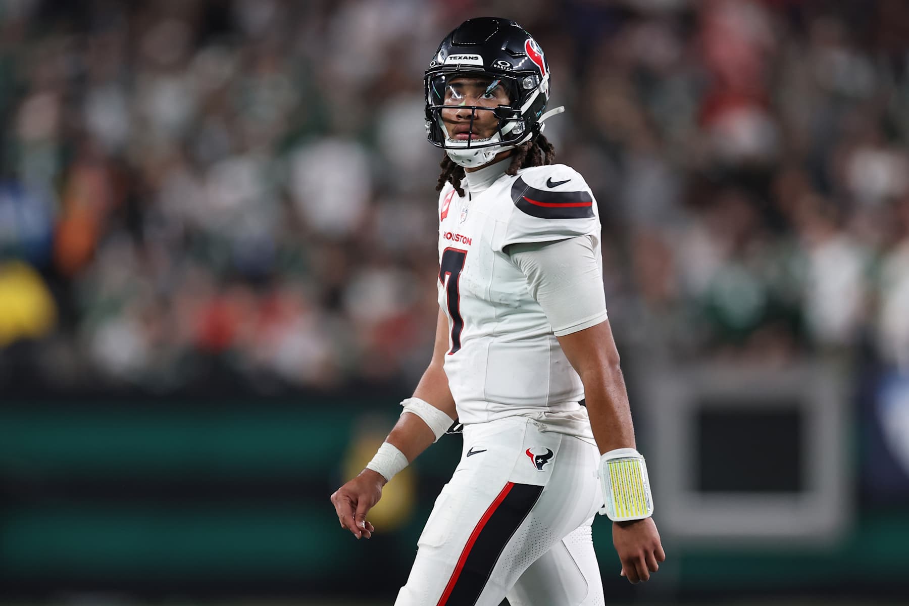 EAST RUTHERFORD, NEW JERSEY - OCTOBER 31: C.J. Stroud #7 of the Houston Texans looks on during the fourth quarter against the New York Jets at MetLife Stadium on October 31, 2024 in East Rutherford, New Jersey. (Photo by Luke Hales/Getty Images)