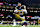 NEW ORLEANS, LOUSIANA - OCTOBER 17: Marshon Lattimore #23 of the New Orleans reacts as he poses for a photo while preparing before an NFL football game against the Denver Broncos at Caesars Superdome on October 17, 2024 in New Orleans, Lousiana , stretches. (Photo by Michael Owens/Getty Images)