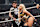 NEW YORK, NEW YORK - NOVEMBER 1: WWE Women's World Champion Liv Morgan and Dominik Mysterio look on during WWE SmackDown at Barclays Center on November 1, 2024 in New York City. (Photo by WWE/Getty Images)