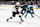 SAN JOSE, CALIFORNIA - NOVEMBER 05: Justin Danforth #17 of the Columbus Blue Jackets puts a shot on goal in front of William Eklund #72 of the San Jose Sharks in the first period at SAP Center on November 05, 2024 in San Jose, California. (Photo by Ezra Shaw/Getty Images)