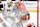 ANAHEIM, CA - NOVEMBER 3:  Connor Bedard #98 of the Chicago Blackhawks slides into Lukas Dostal #1 of the Anaheim Ducks during the second period at Honda Center on November 3, 2024 in Anaheim, California. (Photo by Debora Robinson/NHLI via Getty Images)