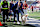 BLOOMINGTON, IN – OCTOBER 26: ESPN College GameDay analyst Kirk Herbstreit walks onto the field with his dog Ben before a college football game between the Washington Huskies and the Indiana Hoosiers on October 26, 2024 at Memorial Stadium in Bloomington, IN (Photo by James Black/Icon Sportswire via Getty Images)