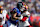 EAST RUTHERFORD, NEW JERSEY - NOVEMBER 03: Theo Johnson #84 of the New York Giants is tackled by Jeremy Chinn #11 of the Washington Commanders during the first quarter at MetLife Stadium on November 03, 2024 in East Rutherford, New Jersey. (Photo by Luke Hales/Getty Images)