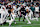 FOXBOROUGH, MA - AUGUST 15: Philadelphia Eagles quarterback Will Grier (13) manages to return the ball during a preseason game between the New England Patriots and the Philadelphia Eagles on August 15, 2024, at Gillette Stadium in Foxborough, Massachusetts. (Photo by Fred Kfoury III/Icon Sportswire via Getty Images)