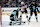 SEATTLE, WASHINGTON - NOVEMBER 12: Joey Daccord #35 of the Seattle Kraken makes a save next to Mathieu Olivier #24 of the Columbus Blue Jackets during the first period at Climate Pledge Arena on November 12, 2024 in Seattle, Washington. (Photo by Steph Chambers/Getty Images)
