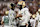 ORLANDO, FLORIDA - SEPTEMBER 28: Head coach Deion Sanders of the Colorado Buffaloes talks with Shedeur Sanders #2 during the second half of a game against the UCF Knights at FBC Mortgage Stadium on September 28, 2024 in Orlando, Florida . (Photo by Julio Aguilar/Getty Images)