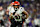 BALTIMORE, MD - NOVEMBER 07: Chase Brown #30 of the Cincinnati Bengals runs the ball during an NFL football game against the Baltimore Ravens at M&T Bank Stadium on November 7, 2024 in Baltimore, Maryland. (Photo by Cooper Neill/Getty Images)