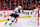 CALGARY, AB - NOVEMBER 11: Tyson Barrie #8 of the Calgary Flames skates against Andre Lee #47 of the Los Angeles Kings at Scotiabank Saddledome on November 11, 2024 in Calgary, Alberta, Canada. (Photo by Gerry Thomas/NHLI via Getty Images)