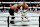 US retired pro-boxer Mike Tyson (L) and US YouTuber/boxer Jake Paul (R) fight during the heavyweight boxing bout at The Pavilion at AT&T Stadium in Arlington, Texas, November 15, 2024. (Photo by TIMOTHY A. CLARY / AFP) (Photo by TIMOTHY A. CLARY/AFP via Getty Images)
