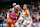 OKLAHOMA CITY, OKLAHOMA - NOVEMBER 15: Shai Gilgeous-Alexander #2 of the Oklahoma City Thunder drives around Tyus Jones #21 of the Phoenix Suns during the third quarter of the Emirates NBA Cup game at Paycom Center on November 15, 2024 in Oklahoma City. Oklahoma. NOTICE TO USER: User expressly acknowledges and agrees that by downloading and or using this photograph, User consents to the terms and conditions of the Getty Images License Agreement. (Photo by William Purnell/Getty Images)