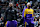 SAN ANTONIO, TX - OCTOBER 22:  Anthony Davis #3 and LeBron James #23 of the Los Angeles Lakers stand for the National Anthem before the NBA Cup game against the San Antonio Spurs on October 22, 2024 at the Frost Bank Center in San Antonio, Texas. NOTE TO USER: User expressly acknowledges and agrees that, by downloading and or using this photograph, user is consenting to the terms and conditions of the Getty Images License Agreement. Mandatory Copyright Notice: Copyright 2024 NBAE (Photos by Michael Gonzales/NBAE via Getty Images)