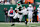 EAST RUTHERFORD, NEW JERSEY - NOVEMBER 17: Quarterback Aaron Rodgers #8 of the New York Jets rolls out to pass during the first quarter against the Indianapolis Colts at MetLife Stadium on November 17, 2024 in East Rutherford, New Jersey. (Photo by Luke Hales/Getty Images)