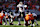 DENVER, COLORADO – NOVEMBER 17: Quarterback Kirk Cousins ​​​​#18 of the Atlanta Falcons shouts orders on the line of scrimmage during the first quarter against the Denver Broncos at Empower Field At Mile High on November 17, 2024 in Denver, Colorado. (Photo by Matthew Stockman/Getty Images)