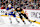 Pittsburgh Penguins defenseman Marcus Pettersson (right) and Buffalo Sabres forward Alex Tuch.