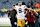 CHICAGO, ILLINOIS - NOVEMBER 17: Christian Watson #9 of the Green Bay Packers celebrates after his team's 20-19 win against the Chicago Bears at Soldier Field on November 17, 2024 in Chicago, Illinois. (Photo by Quinn Harris/Getty Images)