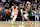 MILWAUKEE, WISCONSIN - NOVEMBER 18: Jalen Green #4 of the Houston Rockets drives around Gary Trent Jr. #5 of the Milwaukee Bucks during a game at Fiserv Forum on November 18, 2024 in Milwaukee, Wisconsin. NOTE TO USER: User expressly acknowledges and agrees that, by downloading and or using this photograph, User is consenting to the terms and conditions of the Getty Images License Agreement. (Photo by Stacy Revere/Getty Images)