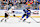 ST. LOUIS, MO - SEPTEMBER 28: St. Louis Blues leftwing Brandon Saad (20) controls the puck with pressure from Chicago Blackhawks defenseman Kevin Korchinski (14) during a preseason NHL game between the Chicago Blackhawks and the St. Louis Blues, on September 28, 2024, at Enterprise Center, St. Louis, MO. (Photo by Keith Gillett/IconSportswire)