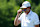 COLLEGE GROVE, TN - JUNE 20: Hockey Hall of Fame member Wayne Gretzky looks over his sunglasses to watch his tee shot during a pro-am practice round during LIV Golf Nashville, June 20, 2024, at The Grove in College Grove, Tennessee.  (Photo by Matthew Maxey/Icon Sportswire via Getty Images)