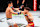 MACAU, CHINA - NOVEMBER 23: (R-L) Lone'er Kavanagh of England punches Jose Ochoa of Peru in their flyweight fight during the UFC Fight Night event at Galaxy Arena on November 23, 2024 in Macau, China. (Photo by Jeff Bottari/Zuffa LLC)