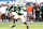 MIAMI GARDENS, FLORIDA - NOVEMBER 23: Cam Ward #1 of the Miami Hurricanes scrambles against the Wake Forest Demon Deacons during the first half at Hard Rock Stadium on November 23, 2024 in Miami Gardens, Florida. (Photo by Carmen Mandato/Getty Images)
