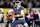 NEW YORK, NEW YORK - NOVEMBER 23: Riley Leonard #13 of the Notre Dame Fighting Irish throws a pass during the second quarter of the game against the Army Black Knights at Yankee Stadium on November 23, 2024 in New York City. (Photo by Dustin Satloff/Getty Images)