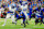 INDIANAPOLIS, INDIANA - NOVEMBER 24: Jahmyr Gibbs #26 of the Detroit Lions runs for a touchdown against Samuel Womack III #33 and EJ Speed ​​#45 of the Indianapolis Colts during the third quarter at Lucas Oil Stadium on November 24, 2024 in Indianapolis , Indiana. (Photo by Justin Casterline/Getty Images)