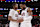 CHICAGO, ILLINOIS - NOVEMBER 11: Darius Garland (L) #10 of the Cleveland Cavaliers and Donovan Mitchell #45 of the Cleveland Cavaliers celebrate their win over the Chicago Bulls at the United Center on November 11, 2024 in Chicago, Illinois. NOTE TO USER: User expressly acknowledges and agrees that, by downloading and or using this photograph, User is consenting to the terms and conditions of the Getty Images License Agreement. (Photo by Geoff Stellfox/Getty Images)