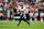 LAS VEGAS, NEVADA – NOVEMBER 24: Bo Nix #10 of the Denver Broncos struggles and attempts to pass during an NFL football game against the Las Vegas Raiders at Allegiant Stadium on November 24, 2024 in Las Vegas, Nevada. (Photo by Michael Owens/Getty Images)