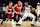 MIAMI, FLORIDA - NOVEMBER 26: Damian Lillard #0 of the Milwaukee Bucks dribbles the ball against Pelle Larsson #9 of the Miami Heat during the third quarter at Kaseya Center on November 26, 2024 in Miami, Florida. NOTE TO USER: User expressly acknowledges and agrees that, by downloading and or using this photograph, User is consenting to the terms and conditions of the Getty Images License Agreement. (Photo by Megan Briggs/Getty Images)
