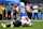 INGLEWOOD, CA - OCTOBER 27: New Orleans Saints defensive tackle Nathan Shepherd (93) rolls up on Los Angeles Chargers quarterback Justin Herbert (10) ankles during the game between the Saints and the Chargers on October 27, 2024, at SoFi Stadium in Inglewood, CA. (Photo by David Dennis/Icon Sportswire via Getty Images)