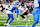 DETROIT, MICHIGAN – NOVEMBER 28: Keenan Allen #13 of the Chicago Bears passes the ball for a touchdown in the fourth quarter against Amik Robertson #21 of the Detroit Lions at Ford Field on November 28, 2024 in Detroit, Michigan. (Photo by Gregory Shamus/Getty Images)