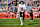 DENVER, COLORADO - NOVEMBER 17: Quarterback Kirk Cousins #18 of the Atlanta Falcons warms up prior to an NFL football game against the Denver Broncos at Empower Field at Mile High on November 17, 2024 in Denver, Colorado. (Photo by Brooke Sutton/Getty Images)