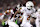 COLLEGE STATION, TEXAS - NOVEMBER 30: Derek Williams Jr. #2 of the Texas Longhorns runs the ball against Marcus Ratcliffe #3 of the Texas A&M Aggies during the third quarter at Kyle Field on November 30, 2024 in College Station, Texas. (Photo by Alex Slitz/Getty Images)