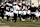 BOULDER, COLORADO - NOVEMBER 29: Head coach Deion Sanders of the Colorado Buffaloes runs out with his team prior to the game against the Oklahoma State Cowboys at Folsom Field on November 29, 2024 in Boulder, Colorado. (Photo by Andrew Wevers/Getty Images)