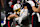 ATLANTA, GEORGIA - DECEMBER 01: Gus Edwards #4 of the Los Angeles Chargers is tackled by Nate Landman #53, Eddie Goldman #99 and Jessie Bates III #3 of the Atlanta Falcons during the first quarter at Mercedes-Benz Stadium on December 01, 2024 in Atlanta, Georgia. (Photo by Kevin C. Cox/Getty Images)