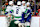 ST PAUL, MINNESOTA - DECEMBER 03: Jake DeBrusk #74 of the Vancouver Canucks (R) celebrates his goal against the Minnesota Wild with teammates in the second period at Xcel Energy Center on December 03, 2024 in St Paul, Minnesota. (Photo by David Berding/Getty Images)