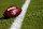 KANSAS CITY, MISSOURI - NOVEMBER 29: A detail of the NFL Shield logo on a game ball prior to a game between the Kansas City Chiefs and the Las Vegas Raiders at GEHA Field at Arrowhead Stadium on November 29, 2024 in Kansas City, Missouri. (Photo by Aaron M. Sprecher/Getty Images)