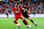 SINGAPORE, SINGAPORE - AUGUST 02: Mohamed Salah #11 of Liverpool controls the ball against Minjae Kim #3 of Bayern Munich during the first half of the pre-season friendly at the National Stadium on August 02, 2023 in Singapore. (Photo by Yong Teck Lim/Getty Images)