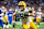 DETROIT, MICHIGAN - DECEMBER 05: Tucker Kraft #85 of the Green Bay Packers runs with the ball for yardage during the fourth quarter of a NFL game against the Detroit Lions at Ford Field on December 05, 2024 in Detroit, Michigan. The Detroit Lions won the game 34-31. (Photo by Aaron J. Thornton/Getty Images)
