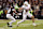 COLLEGE STATION, TEXAS - NOVEMBER 30: Gunnar Helm #85 of the Texas Longhorns gives a stiff arm to Dezz Ricks #10 of the Texas A&M Aggies during the third quarter at Kyle Field on November 30, 2024 in College Station, Texas. (Photo by Tim Warner/Getty Images)
