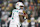 GREEN BAY, WISCONSIN - NOVEMBER 28: Tua Tagovailoa #1 of the Miami Dolphins drops back to pass against the Green Bay Packers at Lambeau Field on November 28, 2024 in Green Bay, Wisconsin. (Photo by John Fisher/Getty Images)
