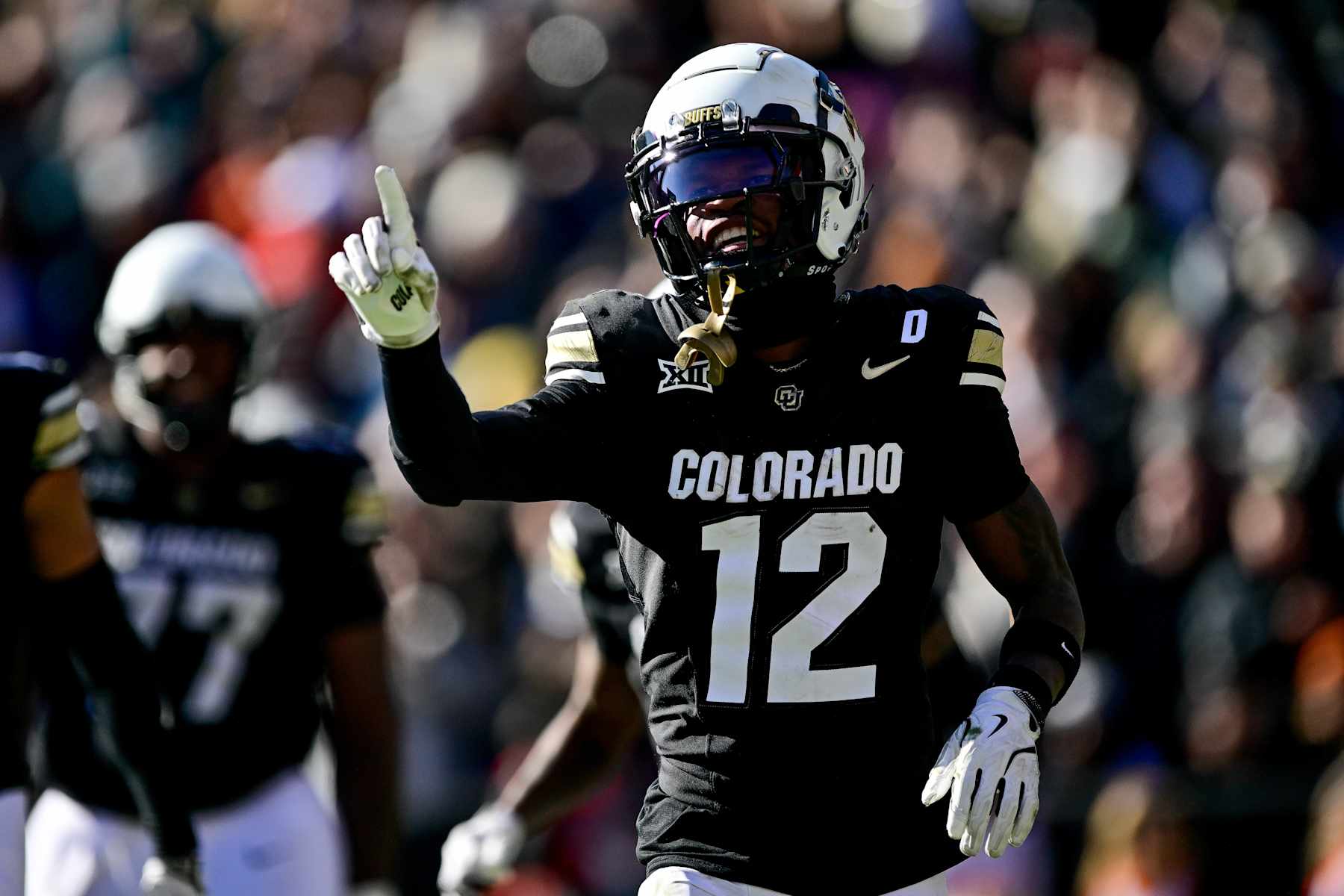 Football Football BOULDER, CO - NOVEMBER 29: Travis Hunter #12 of the Colorado Buffaloes celebrates after a score in the third quarter against the Oklahoma State Cowboys at Folsom Field on November 29, 2024 in Boulder, Colorado. (Photo by Dustin Bradford/Getty Images)