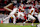 NORMAN, OKLAHOMA - NOVEMBER 23: Quarterback Jackson Arnold #11 of the Oklahoma Sooners throws under pressure from cornerback Domani Jackson #1 of the Alabama Crimson Tide in the fourth quarter at Gaylord Family Oklahoma Memorial Stadium on November 23, 2024 in Norman, Oklahoma. Oklahoma won 24-3. (Photo by Brian Bahr/Getty Images)