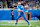 DETROIT, MICHIGAN – DECEMBER 5: Jared Goff #16 of the Detroit Lions runs and attempts to throw the ball against the Green Bay Packers at Ford Field in Detroit, Michigan on December 5, 2024. (Photo by Nic Antaya/Getty Images)