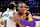 LOS ANGELES, CA - NOVEMBER 13: Scotty Pippen Jr. #1 of the Memphis Grizzlies and Maxwell Lewis #20 of the Los Angeles Lakers embrace after the game on November 13, 2024 at Crypto.com Arena in Los Angeles, California. NOTE TO USER: User expressly acknowledges and agrees that, by downloading and/or using this Photograph, user is consenting to the terms and conditions of the Getty Images License Agreement. Mandatory Copyright Notice: Copyright 2024 NBAE (Photo by Juan Ocampo/NBAE via Getty Images)