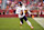 SANTA CLARA, CALIFORNIA - DECEMBER 08: Caleb Williams #18 of the Chicago Bears runs with the ball against the San Francisco 49ers in the fourth quarter at Levi's Stadium on December 08, 2024 in Santa Clara, California. (Photo by Thearon W. Henderson/Getty Images)