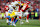 KANSAS CITY, MISSOURI - DECEMBER 08: Isiah Pacheco #10 of the Kansas City Chiefs is tackled by Tarheeb Still #29 of the Los Angeles Chargers during the fourth quarter at GEHA Field at Arrowhead Stadium on December 08, 2024 in Kansas City, Missouri. (Photo by Jamie Squire/Getty Images)