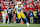 KANSAS CITY, MO - DECEMBER 08: Los Angeles Chargers quarterback Justin Herbert (10) scrambles in the fourth quarter of an NFL game between the Los Angeles Chargers and Kansas City Chiefs on December 8, 2024 at GEHA Field at Arrowhead Stadium in Kansas City, MO. (Photo by Scott Winters/Icon Sportswire via Getty Images)